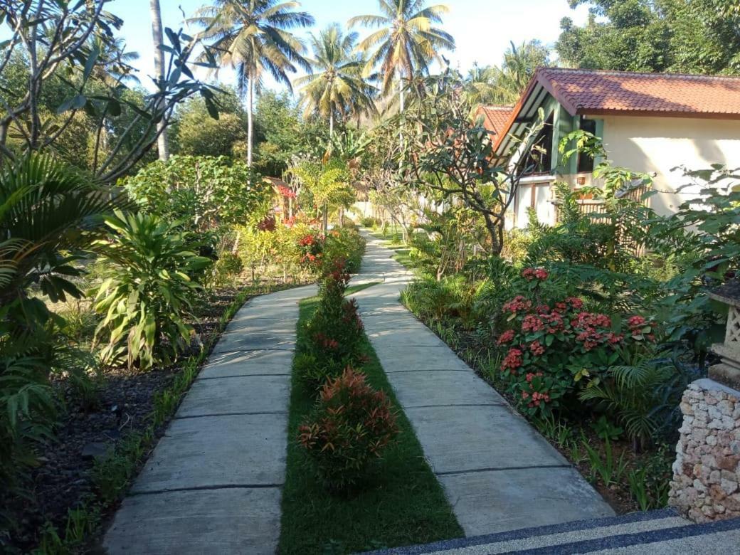 Отель The Hamlet Kuta  Экстерьер фото